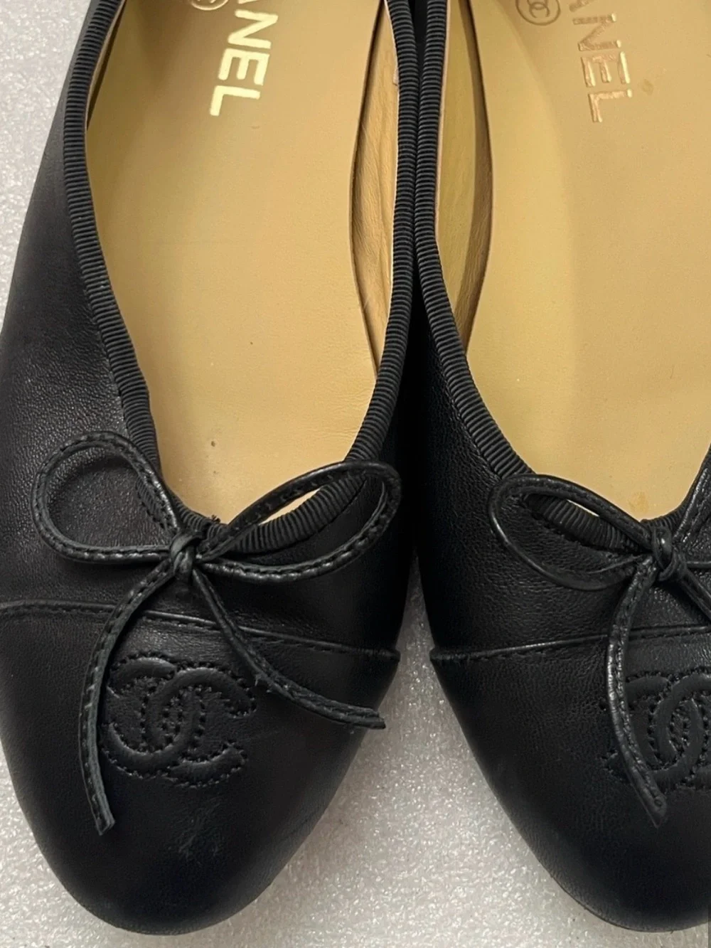 CHANEL Black Leather Ballet Flats with Bow and CC Motif